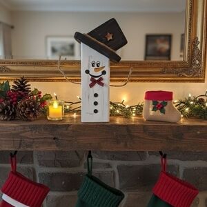 Festive Snowman Holiday Decor with Black Hat